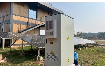 Outdoor cabinet beside rooftop PV